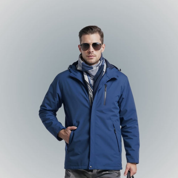 Homme de face portant une veste chauffante bleue pour le travail